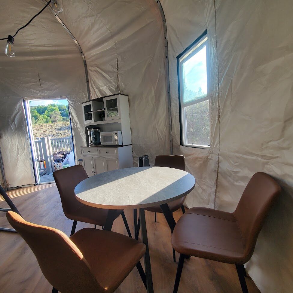 Yurt deck with mountain views at Beckwourth Peak High Camp